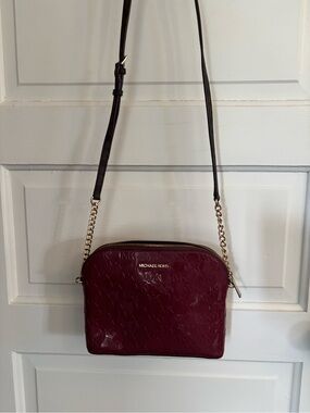 Michael Kors burgundy purse. GUC